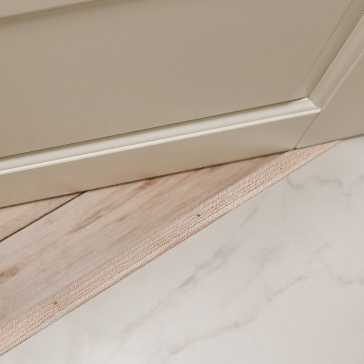 36 in. Natural Hardwood Flat-Profile Threshold for Doorways 1-3/4 in. x 5/16 in. In Use