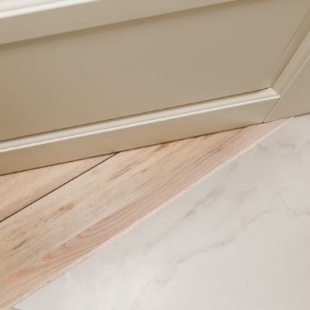 36 in. Natural Hardwood Flat-Profile Threshold for Doorways 2-1/2 in. x 3/8 in. In Use